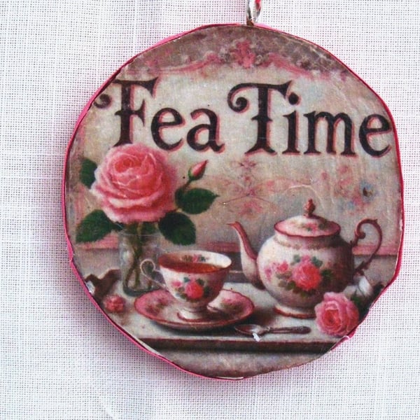 Tea time decoupaged log slice wall decoration.