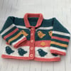 Hand knitted cardigan with chick design