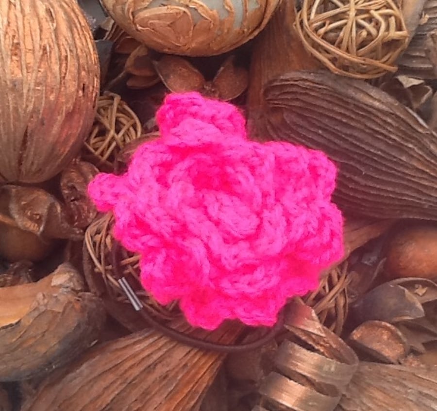 Hot Pink Vibrant Crocheted Rose Hair Accessory with integrated hair elastic.
