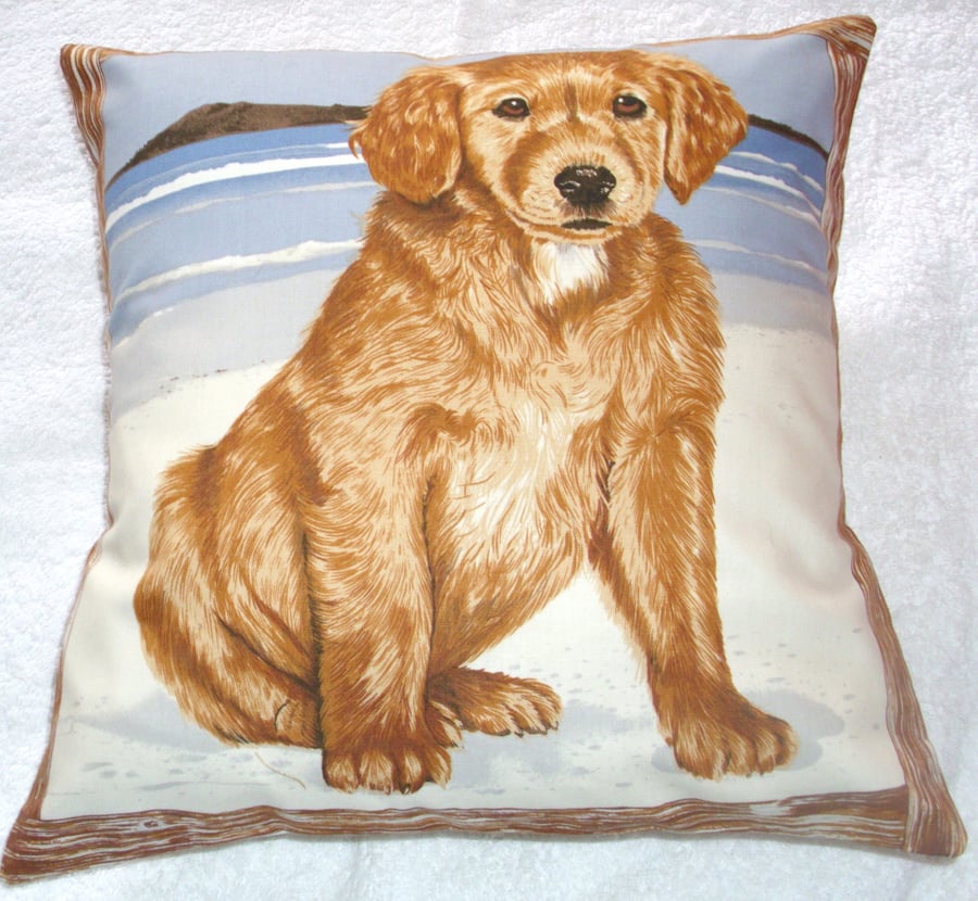 A golden retriever pup on the beach cushion 