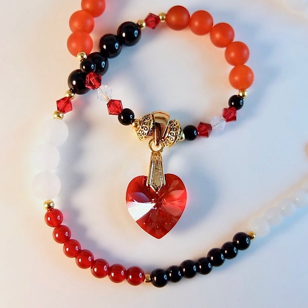 Ruby Red Swarovski Crystal Heart, Carnelian, Black Onyx And White Jade Necklace.