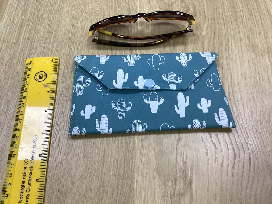 Fabric glasses case holder with popper fastener. Padded glasses pouch