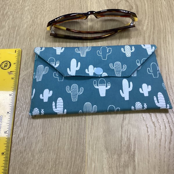 Fabric glasses case holder with popper fastener. Padded glasses pouch