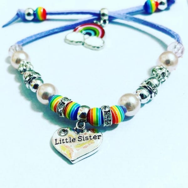 Lilac suede effect corded little sister charm bracelet with rainbow charm 