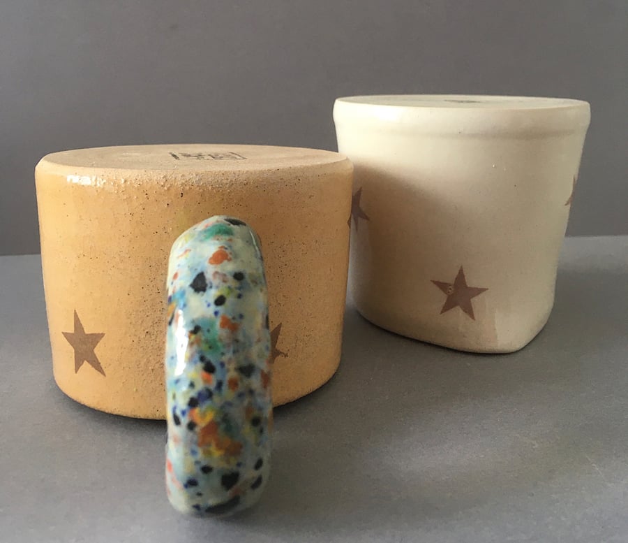 Star set. Handmade ceramic cup and jug.