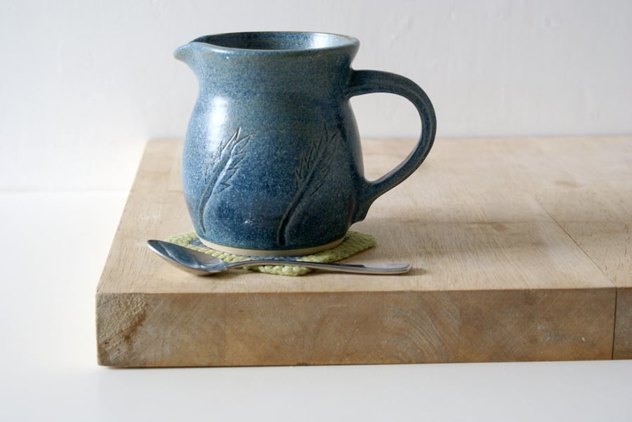 Handmade stoneware pouring jug with wheat design - glazed in smokey blue