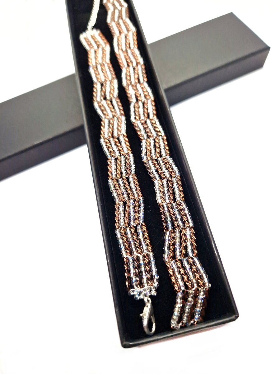 Glittering silver and bronze bugle bead bracelet