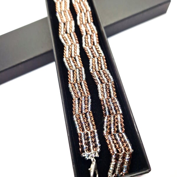 Glittering silver and bronze bugle bead bracelet