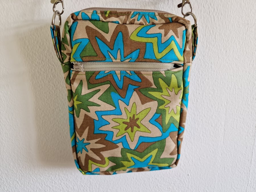 Handmade crossbody bag using repurposed fabrics