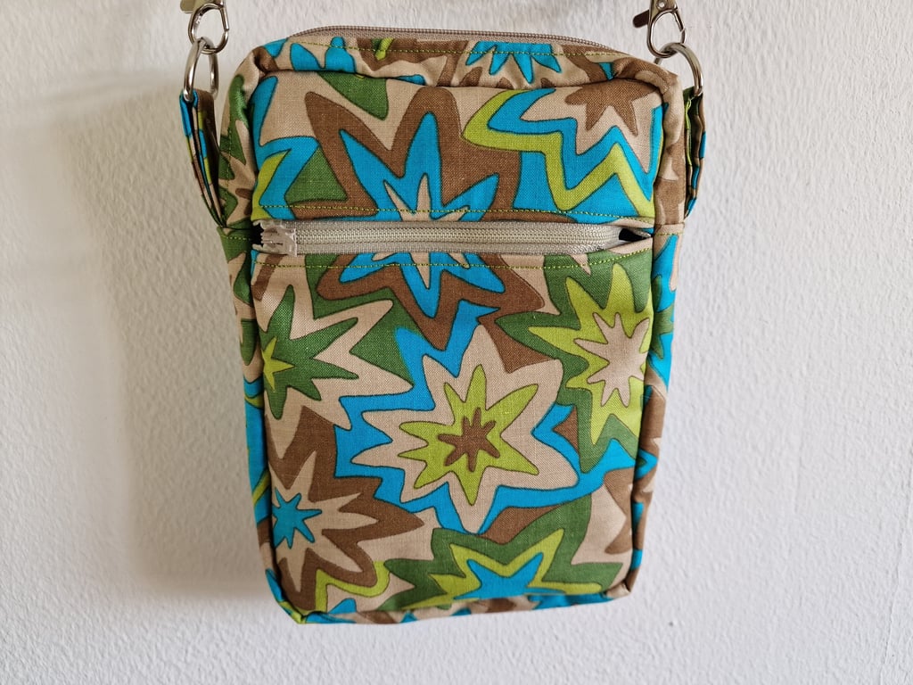 Handmade crossbody bag using repurposed fabrics