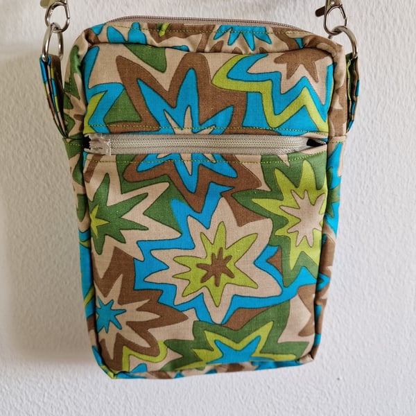 Handmade crossbody bag using repurposed fabrics