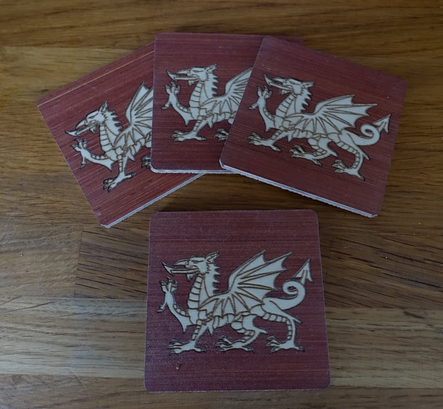 White dragon on red background coasters