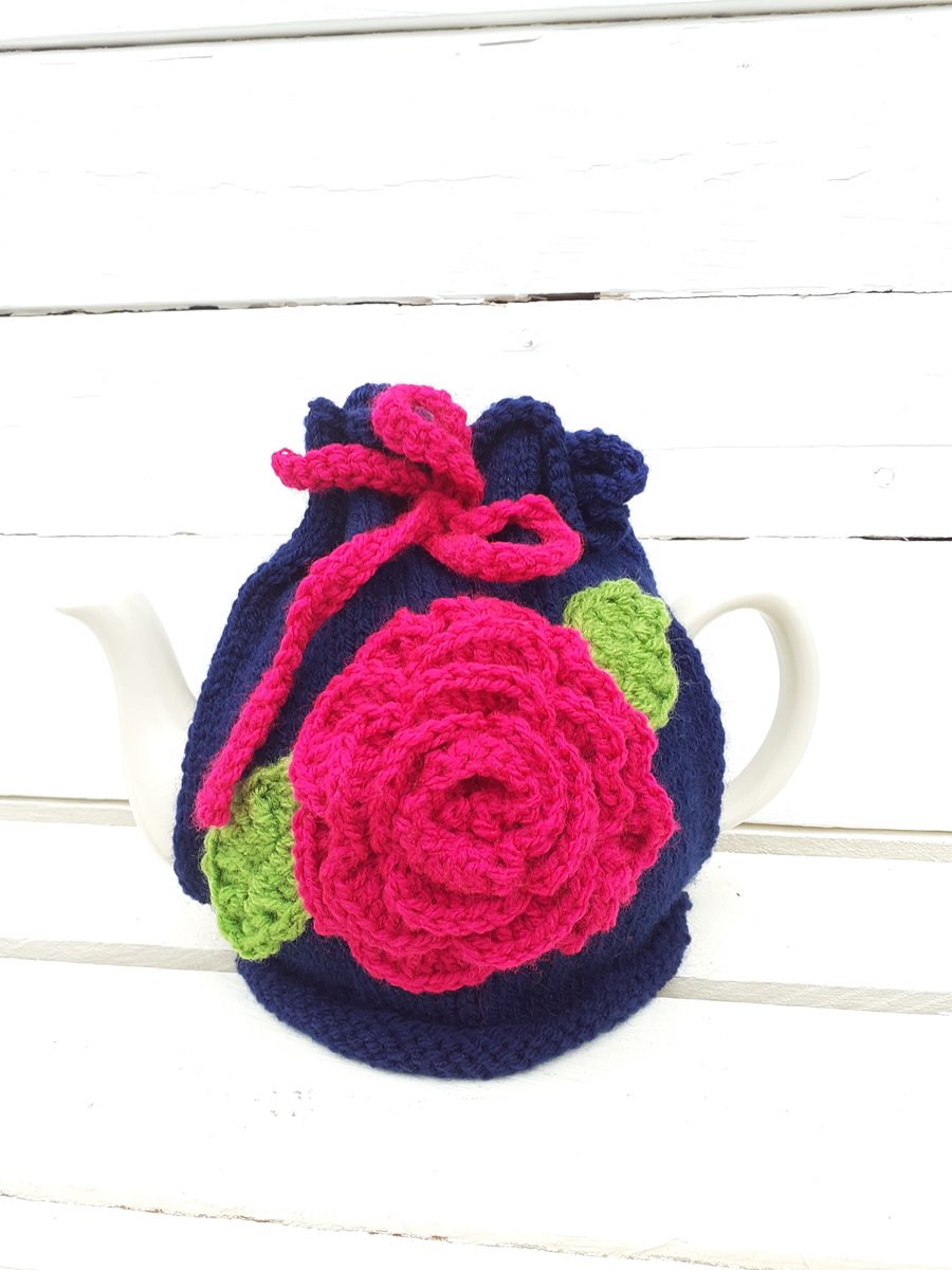 Handknitted Tea Cosy Navy with Large Pink Crochet Flower