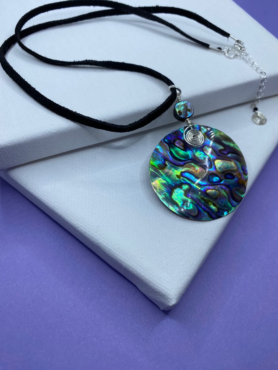 Abalone shell silver plated pendant on black faux suede cord