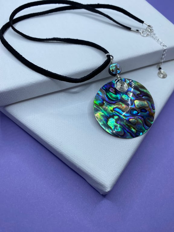 Abalone shell silver plated pendant on black faux suede cord