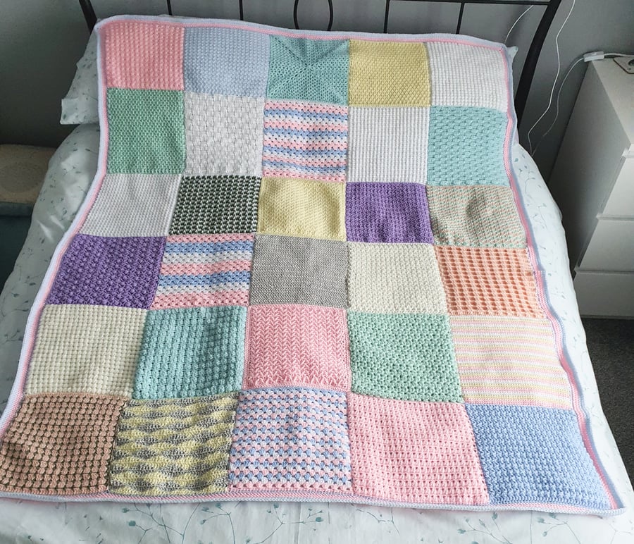 Large pastel coloured, crochet patchwork blanket 