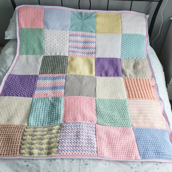 Large pastel coloured, crochet patchwork blanket 