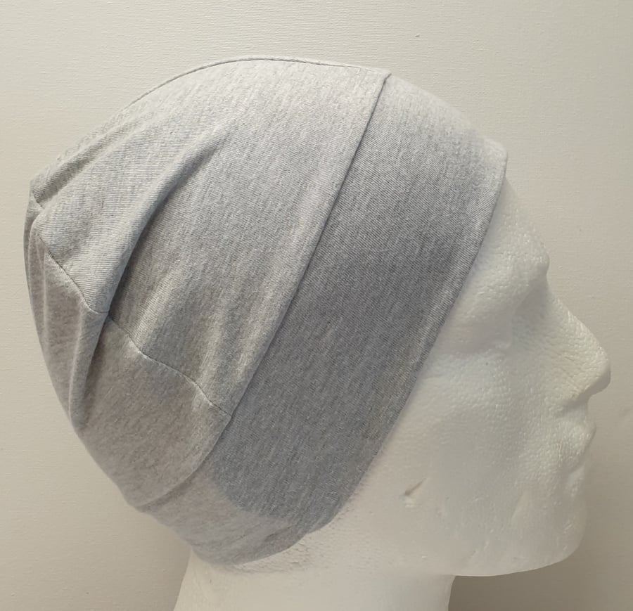 Light grey chemo hat for men.