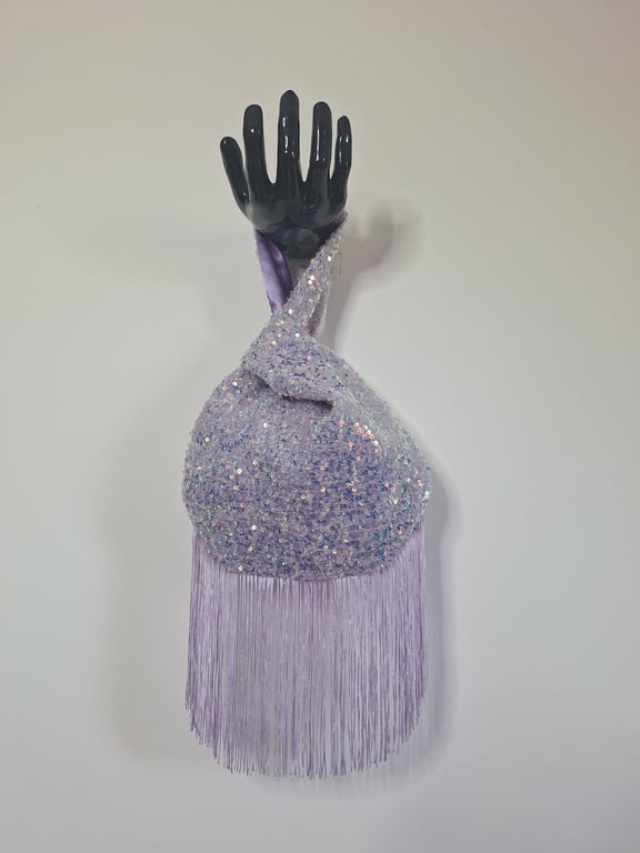 Lilac sequin Japanese Knot bag with 14cm tassel trim and satin lining.