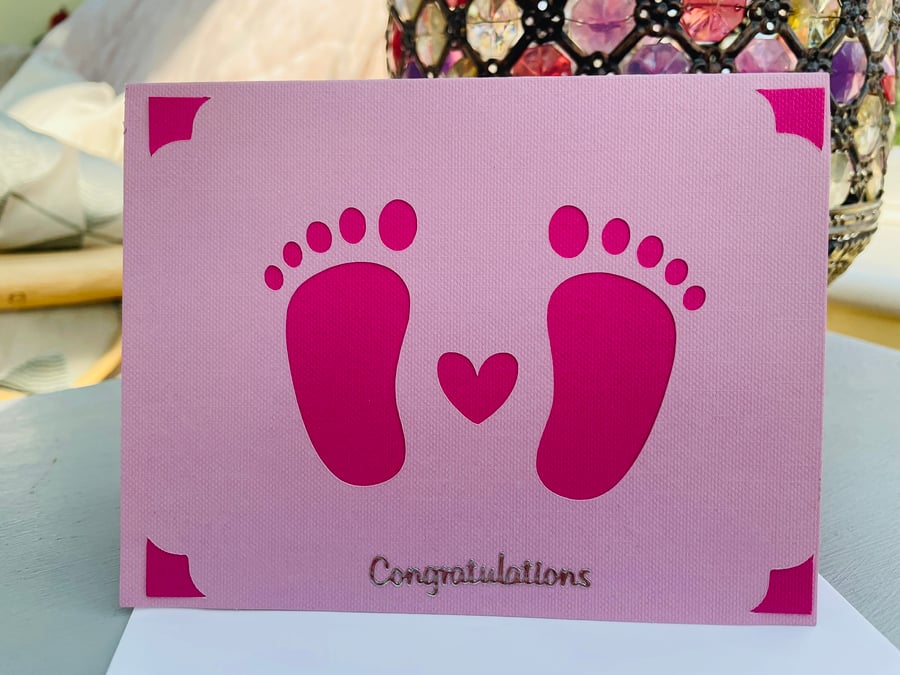 New baby cute footprints congratulations card for a little girl