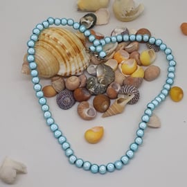 NL19 - Pale blue miracle bead necklace 16"