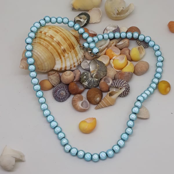 NL19 - Pale blue miracle bead necklace 16"