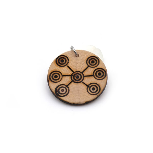 Wooden pendant, geometrical motifs