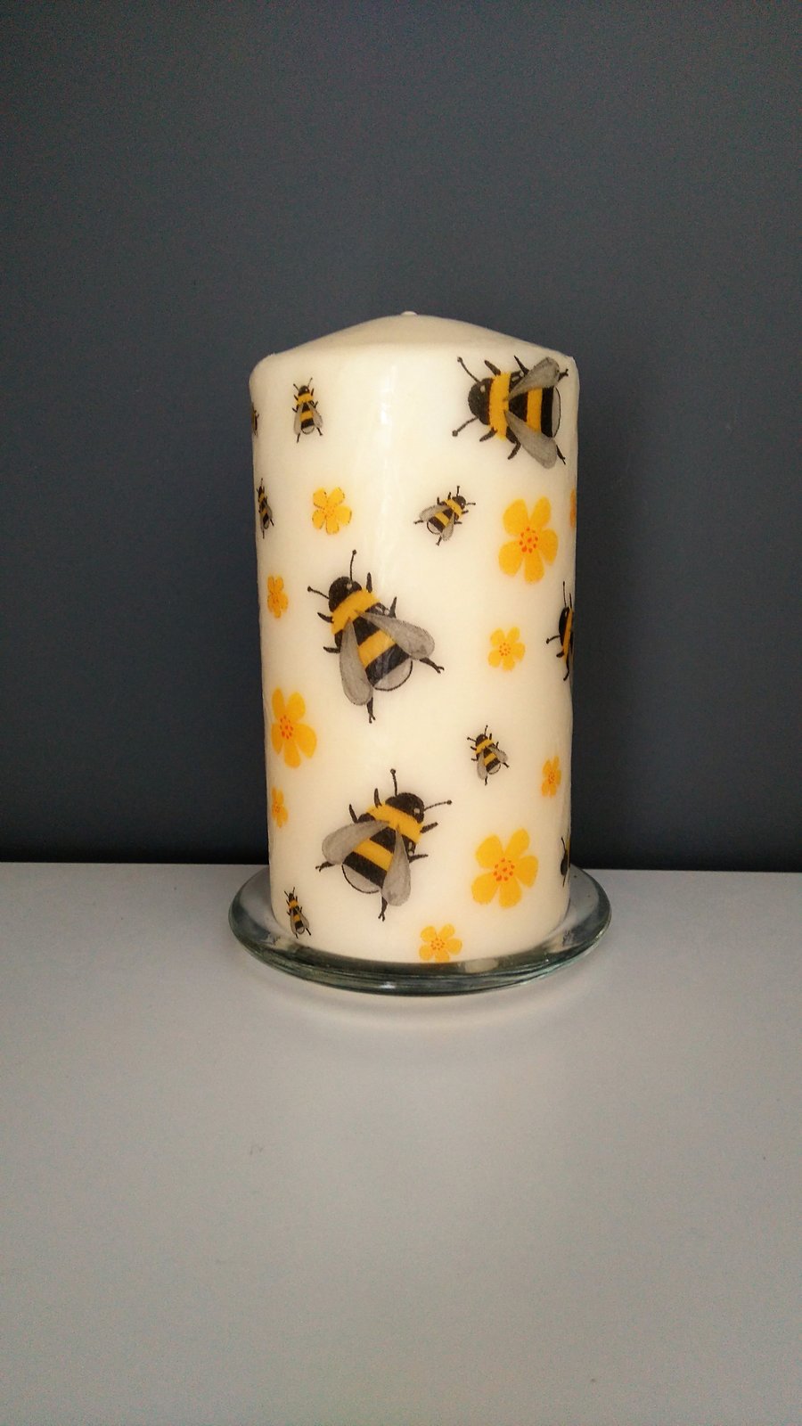 bee decorated candle
