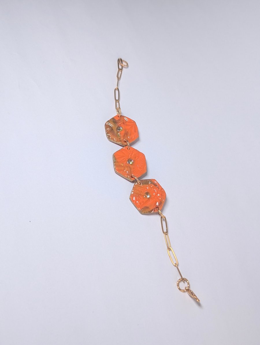 Orange textured polymer clay bracelet with cable chain 