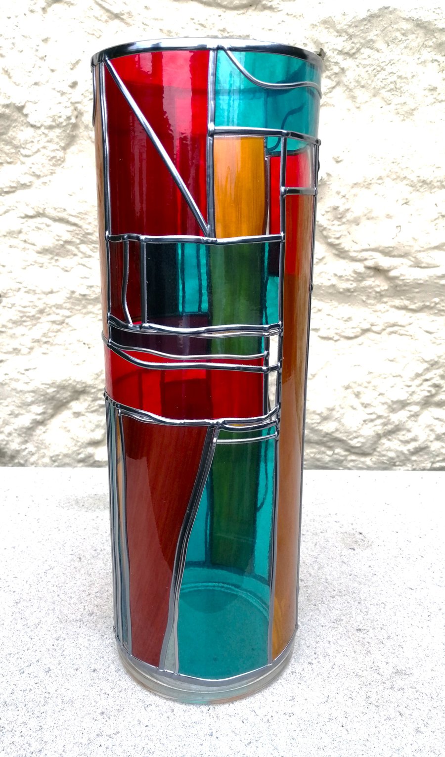 India is a 30cm Tall Art Deco Stained Glass Flower Vase