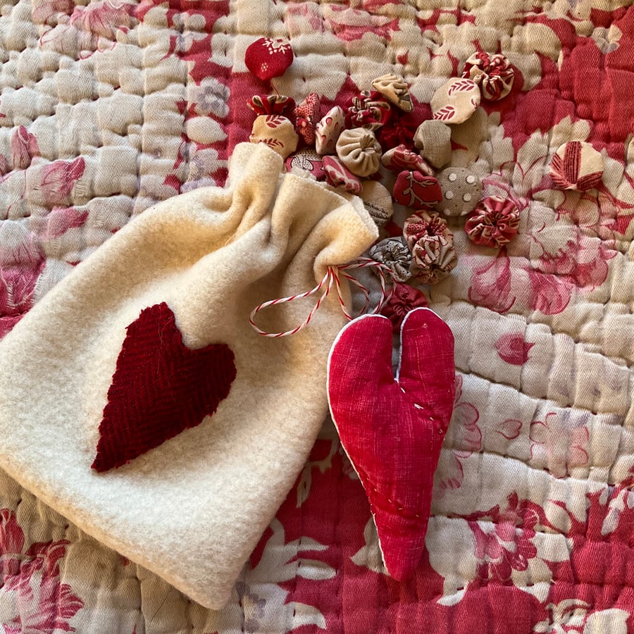 Woollen drawstring bag with contents