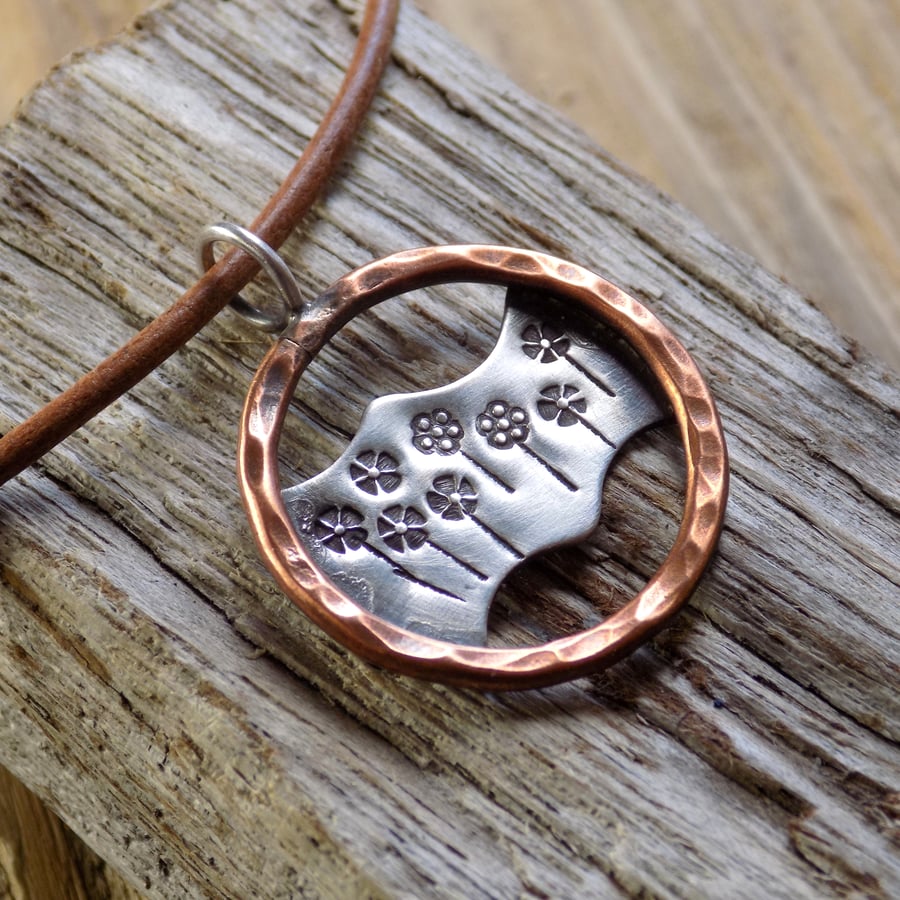 Copper and silver 'posy' pendant, mixed metals