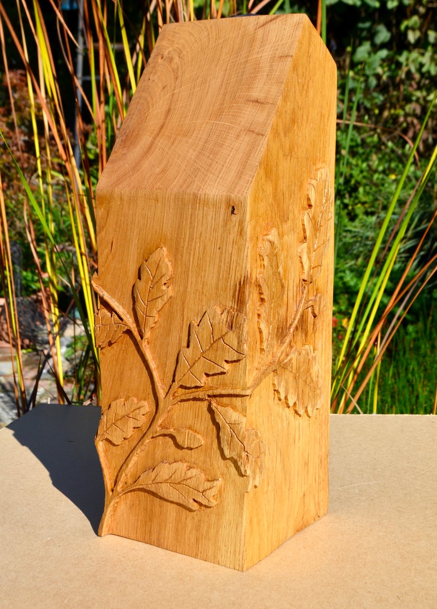 Doorstop in solid oak hand carved with oak leaf design