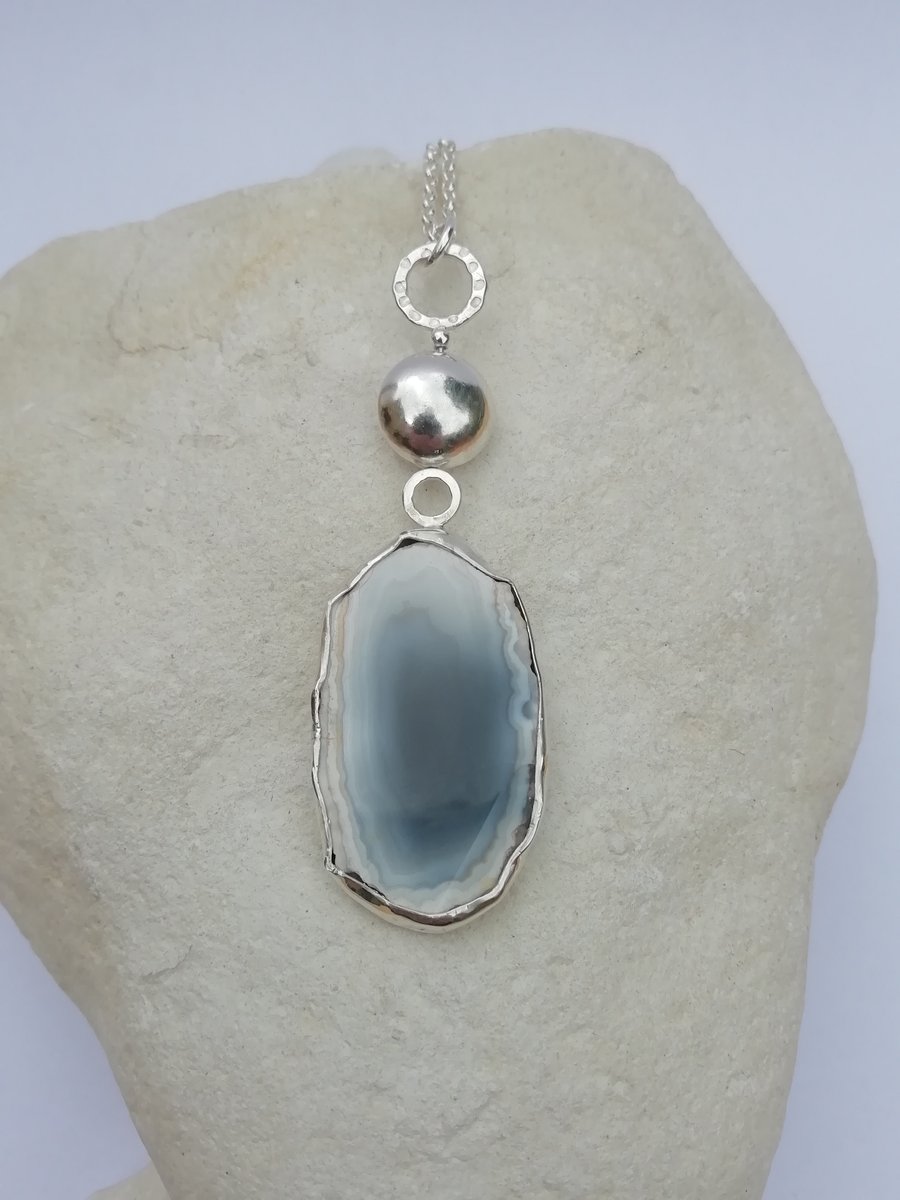 A Slice of Agate with Ring and Ball Bail