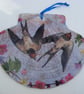 Decoupaged flat scallop shell swallow hanging decoration - Image 1