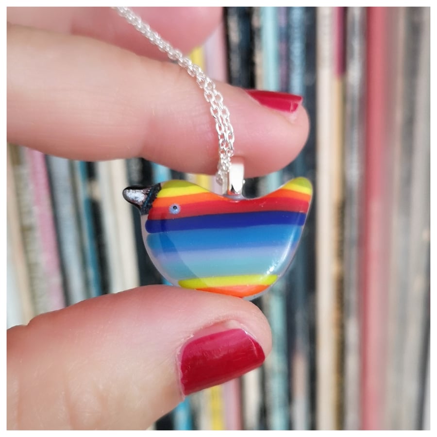 colourful 'Rainbow Wren of Hope' glass pendant on sterling silver chain
