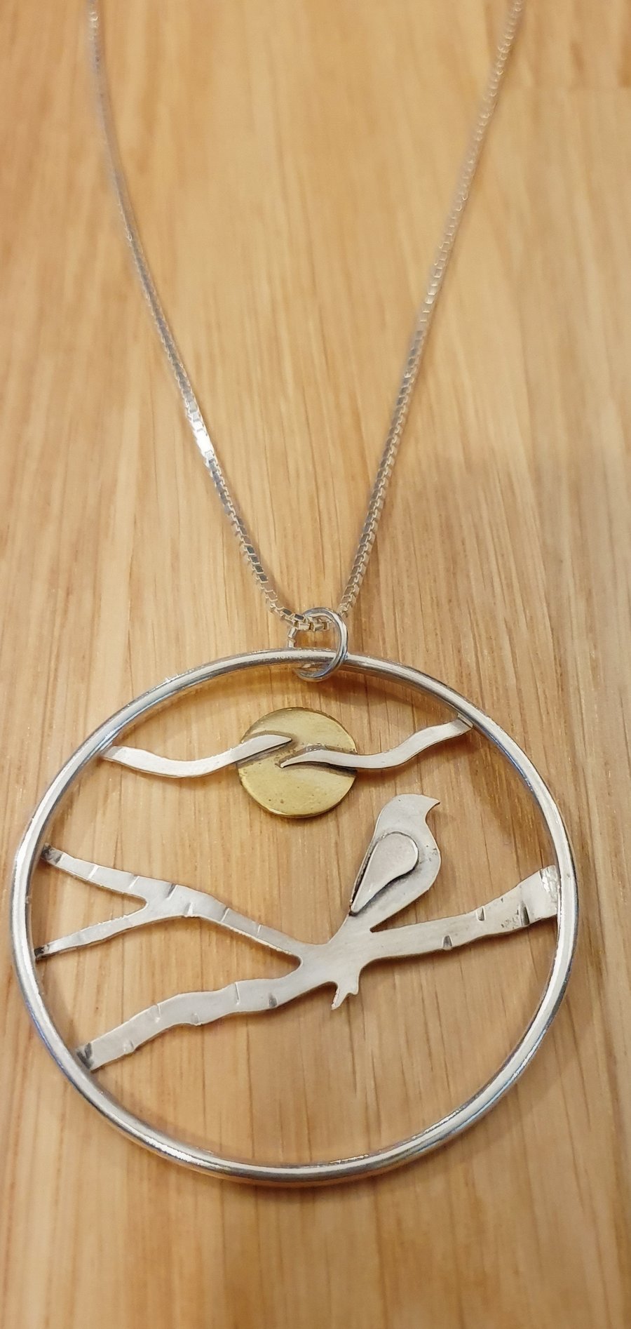 Sterling silver necklace - brass bird in a tree