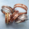 Patterned silver or copper spinner ring 