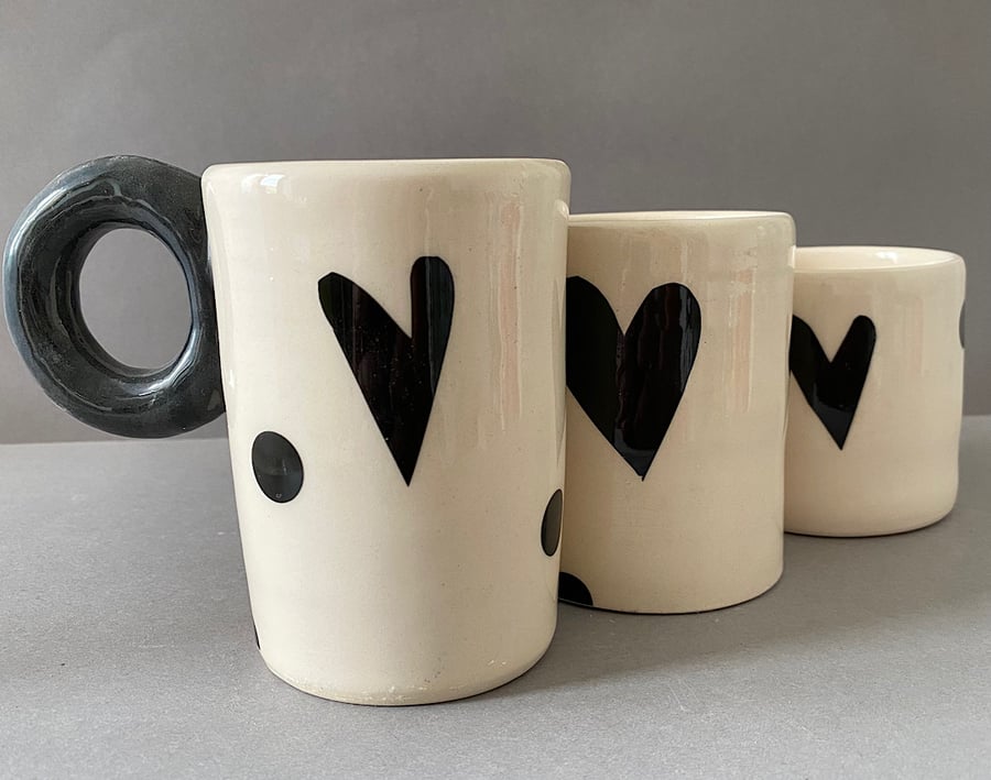 Black love heart trio of ceramic cups.