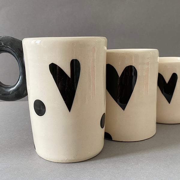 Black love heart trio of ceramic cups.