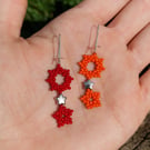 Colourful beaded sun and star dangle earrings