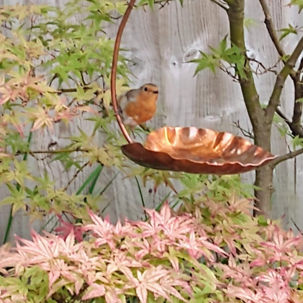 Copper hanging bird feeder