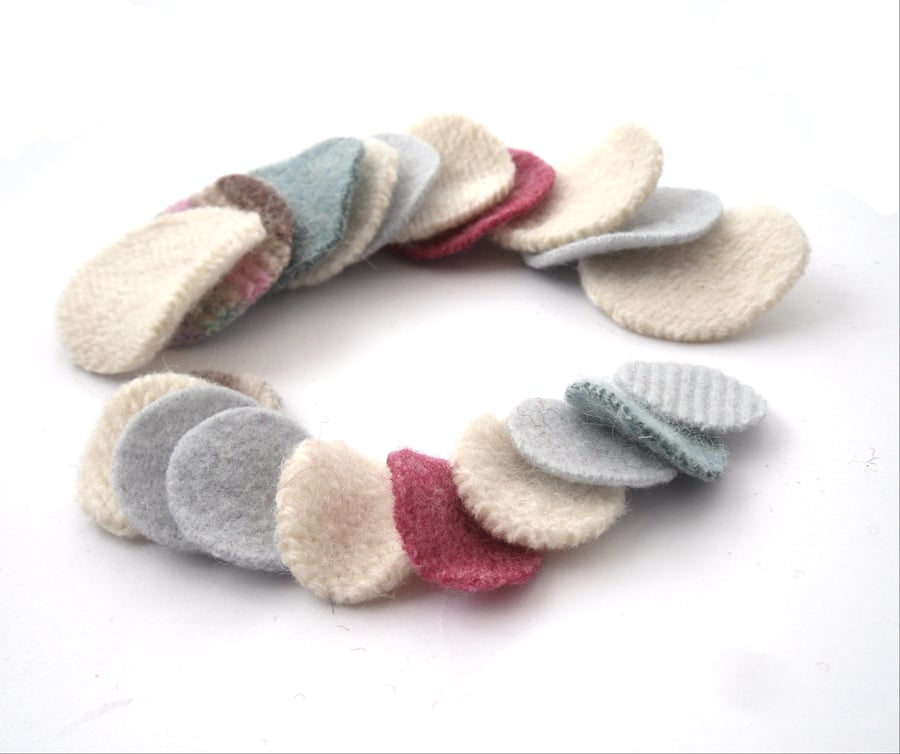 Pastel felt circle shapes made from old recycled wool sweaters