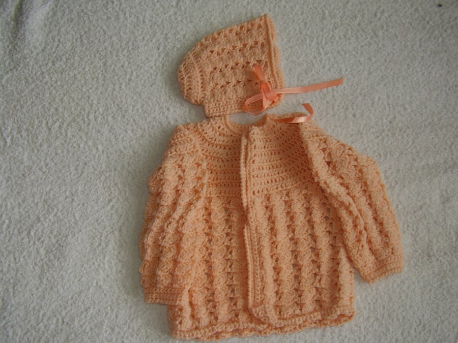 Crochet baby cardigan and hat in apricot wool