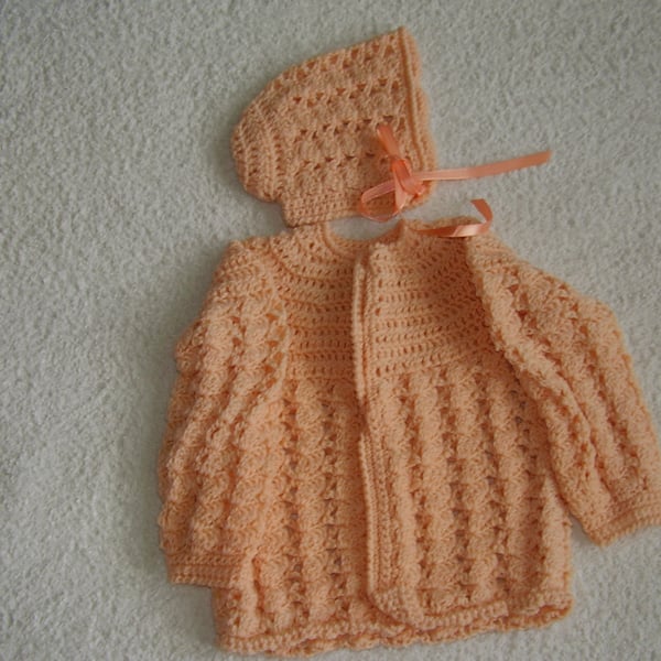 Crochet baby cardigan and hat in apricot wool