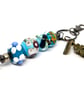 Handmade Ocean Blue & Floral Lampwork Glass Bead with added Charms Unique Gift  - Image 2