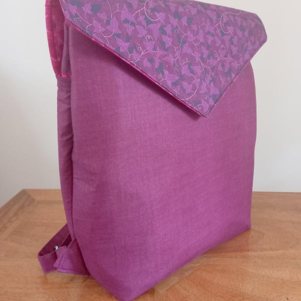 Purple and Pink Backpack with multiple pockets