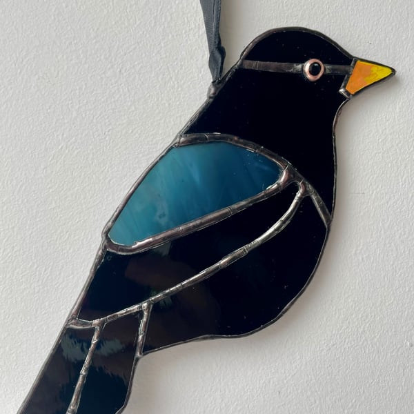 Handmade stained glass black bird ornament