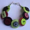 Red, black and lime button bracelet