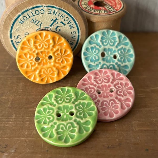 Set of four handmade ceramic buttons